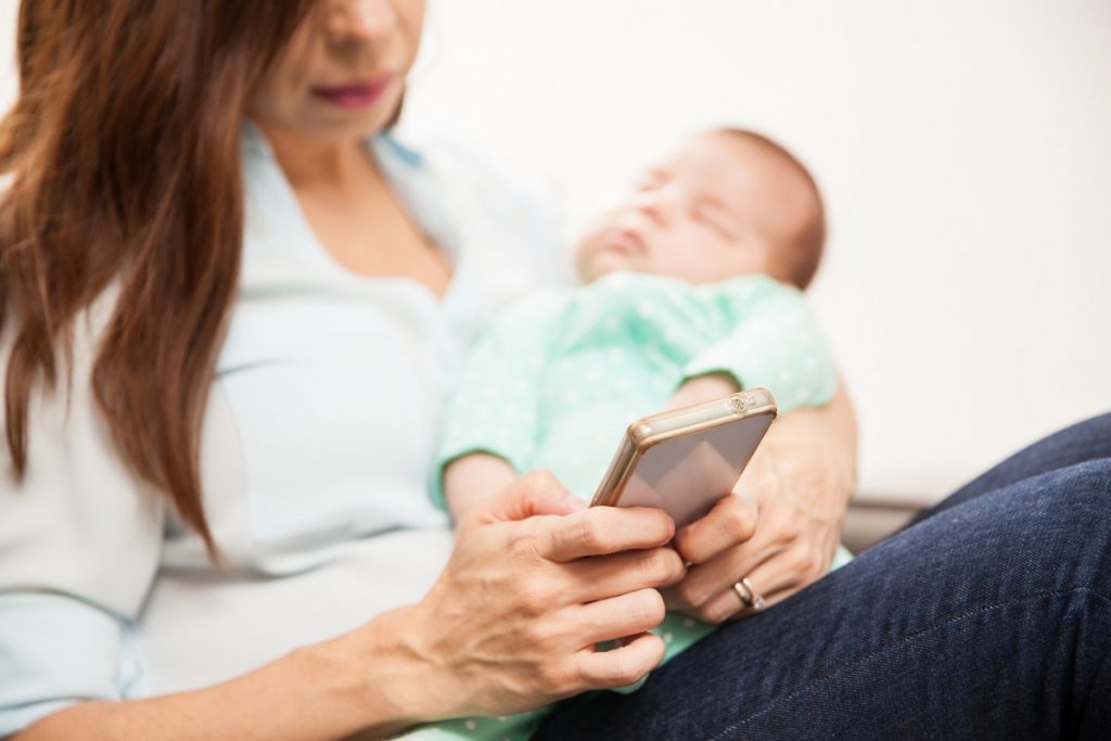 Using smartphone while baby sleeps Kids Care Pediatrics